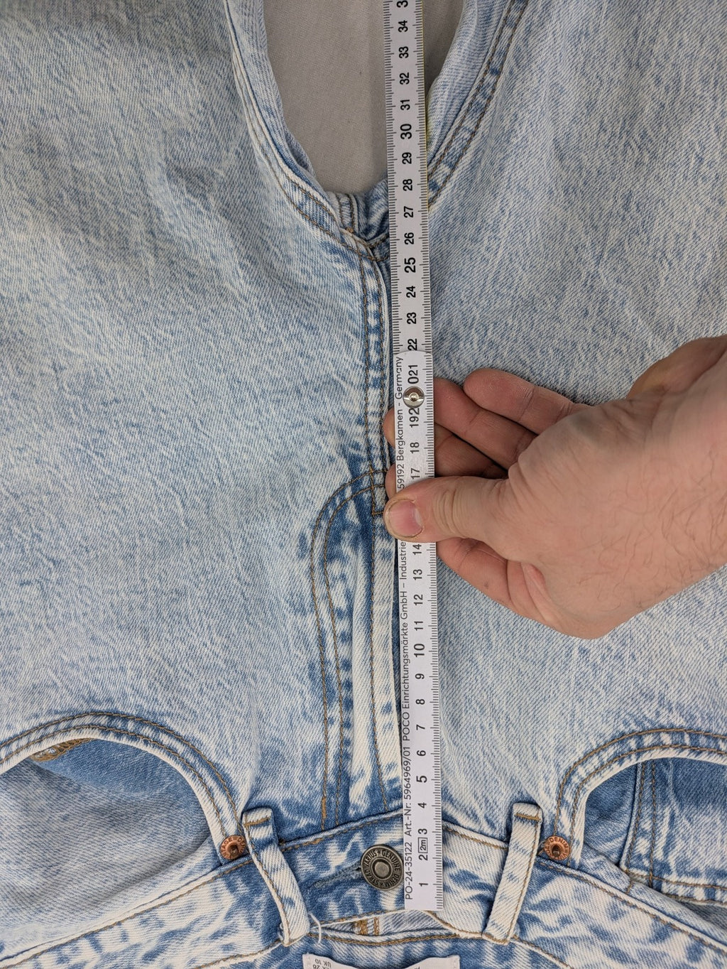 Stradivarius blue high waist flare jeans with acid wash and classic five-pocket design.