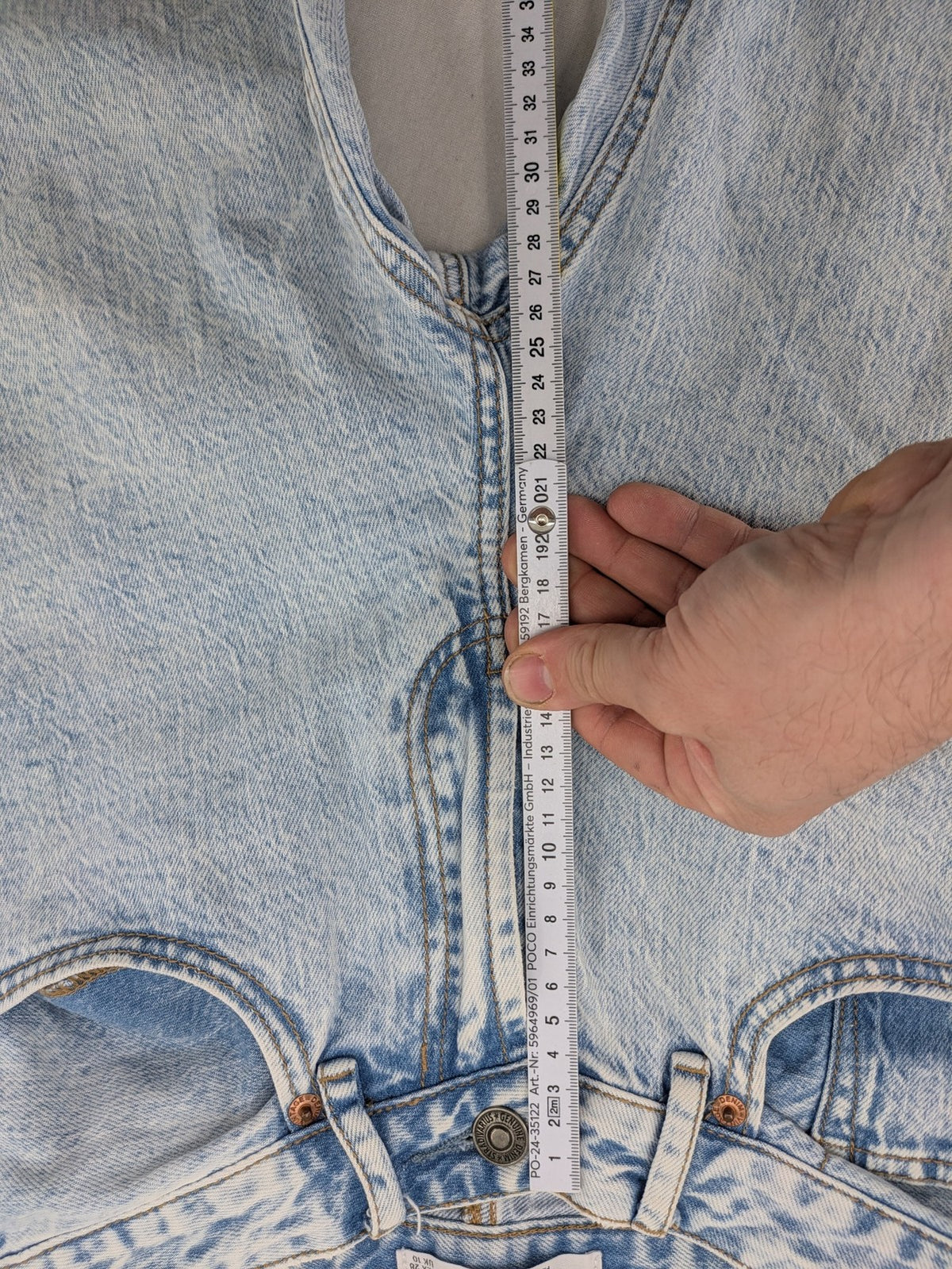 Stradivarius blue high waist flare jeans with acid wash and classic five-pocket design.