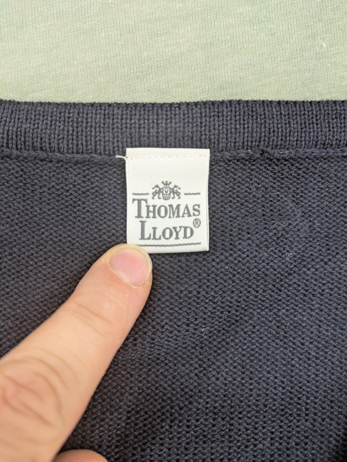 thomas lloyd navy turtle neck jumper with textured knit and embroidered crest logo
