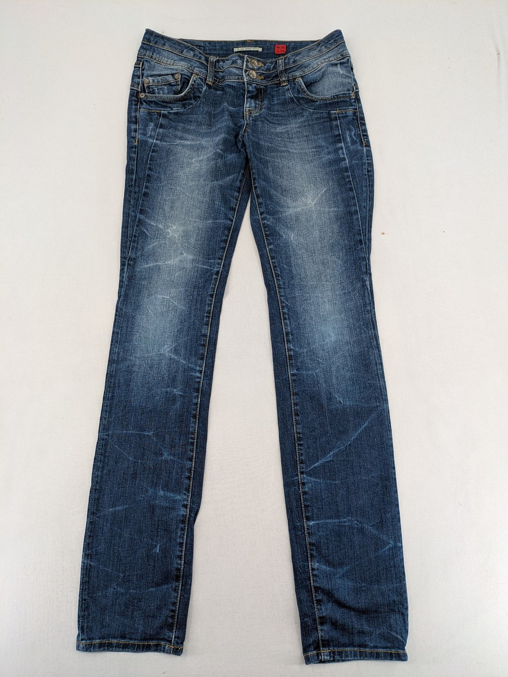 QS by s.Oliver green straight jeans five-pocket design with unique double button closure