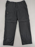 Travel Master black hunting and tactical pants, zip-off design, 100% cotton, multiple pockets.