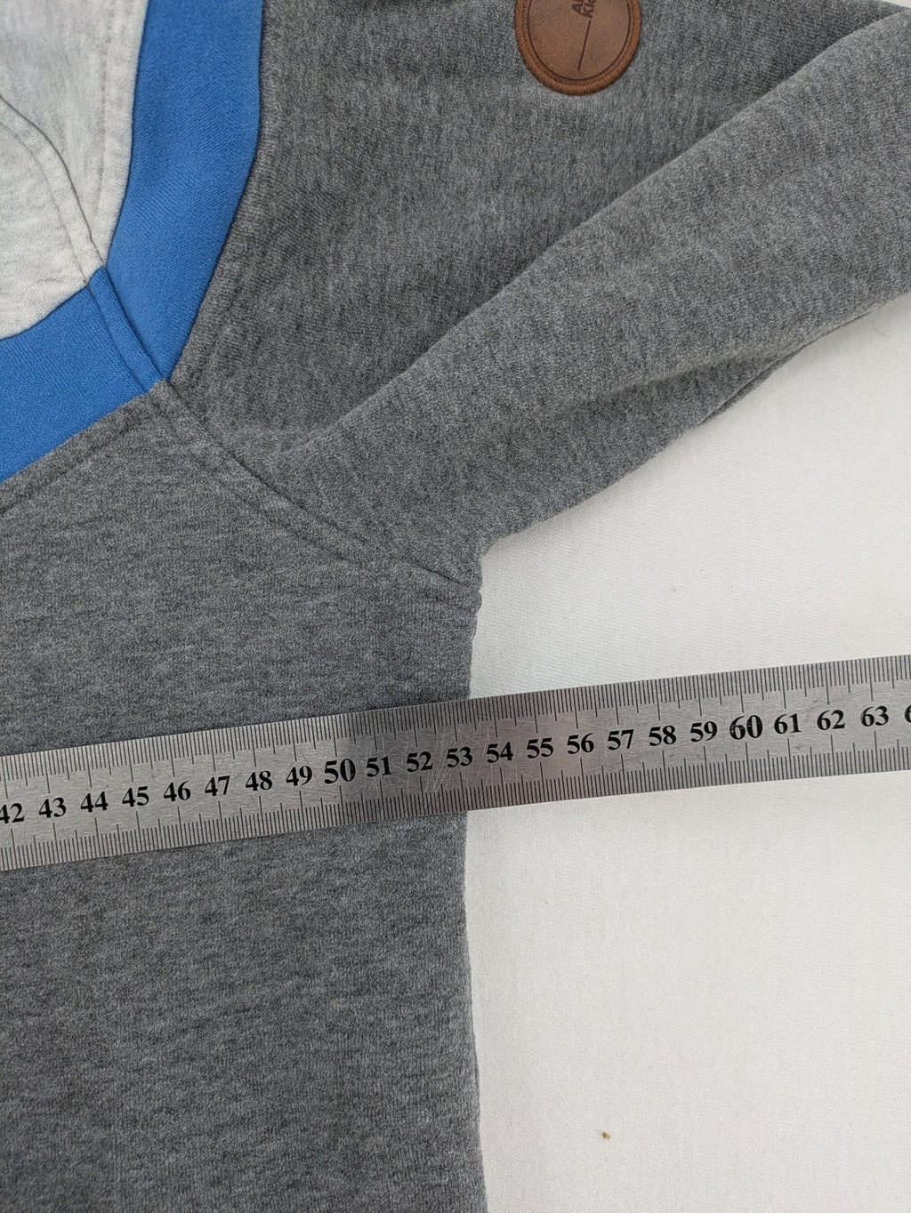 ALIFE turtle neck jumper blue grey colorblock design with logo details and soft cotton blend.