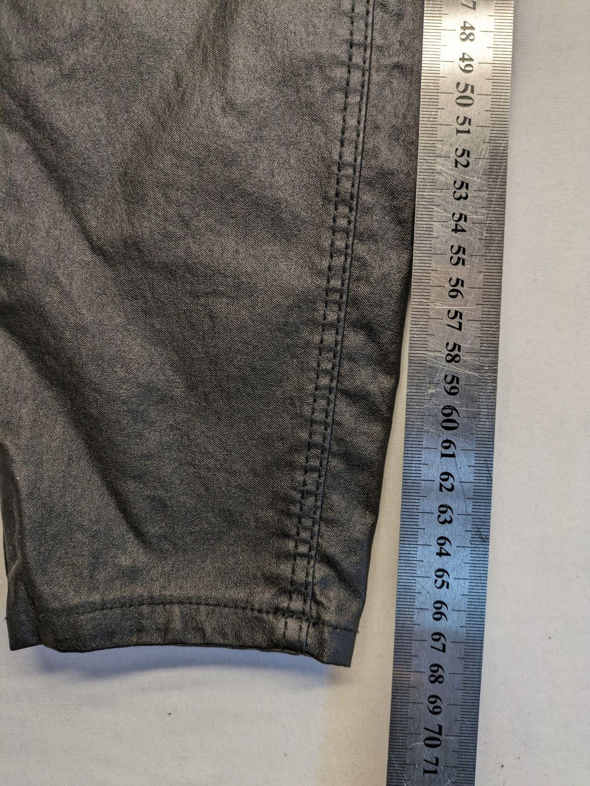 Stradivarius black coated straight jeans with leather-like finish and stretchy material.