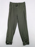 Infinity green jogger pants with elastic waistband and side pockets, soft stretch material.