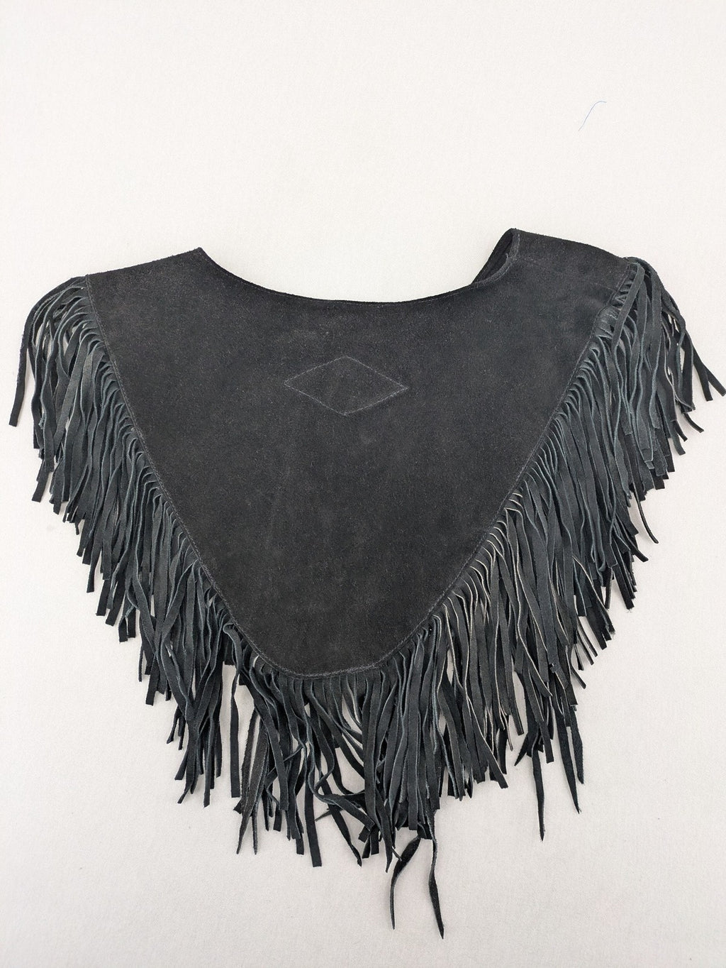 Stars & Stripes black suede fringe vest with silver conchos and beaded tassels.