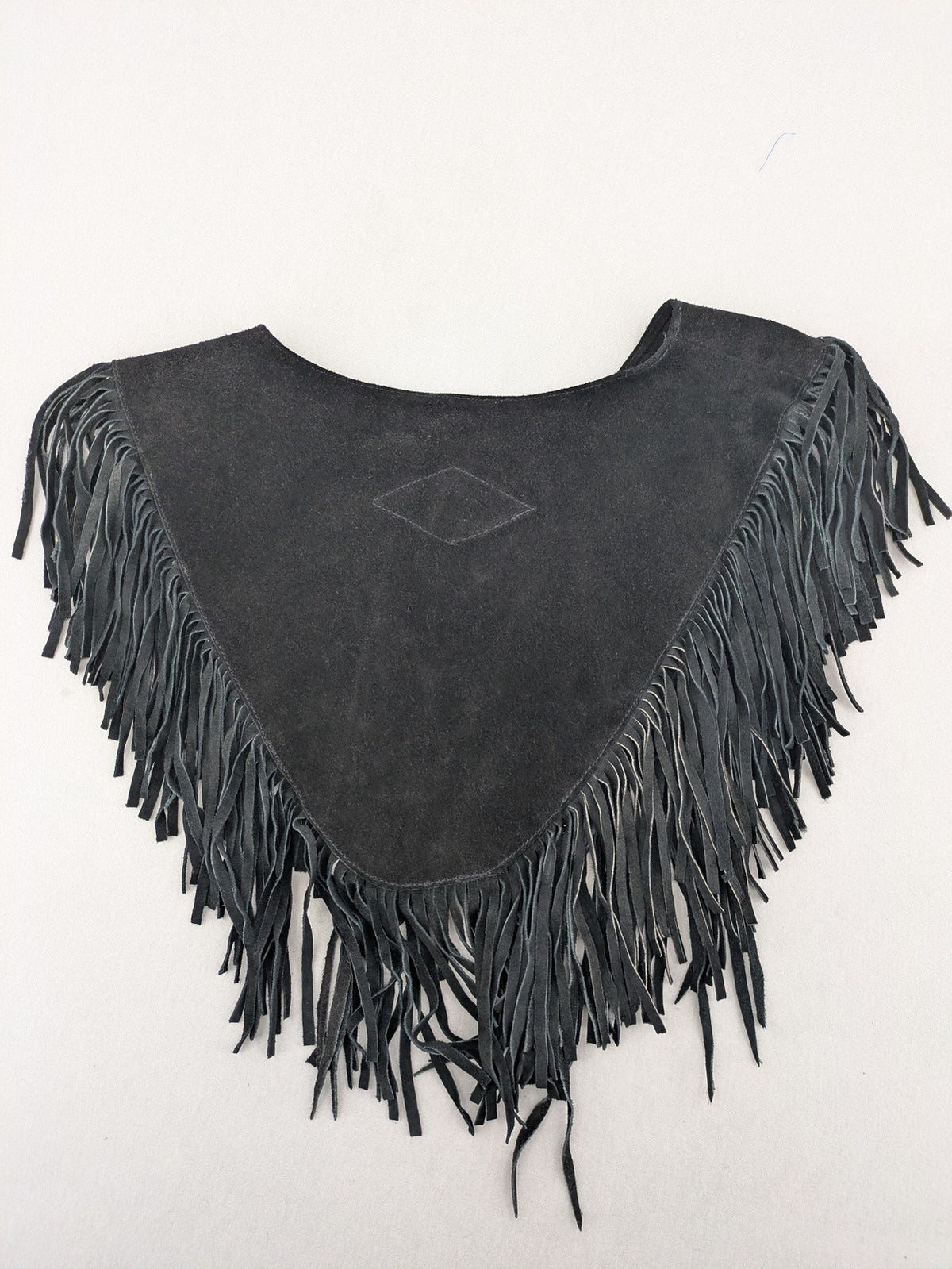 Stars & Stripes black suede fringe vest with silver conchos and beaded tassels.