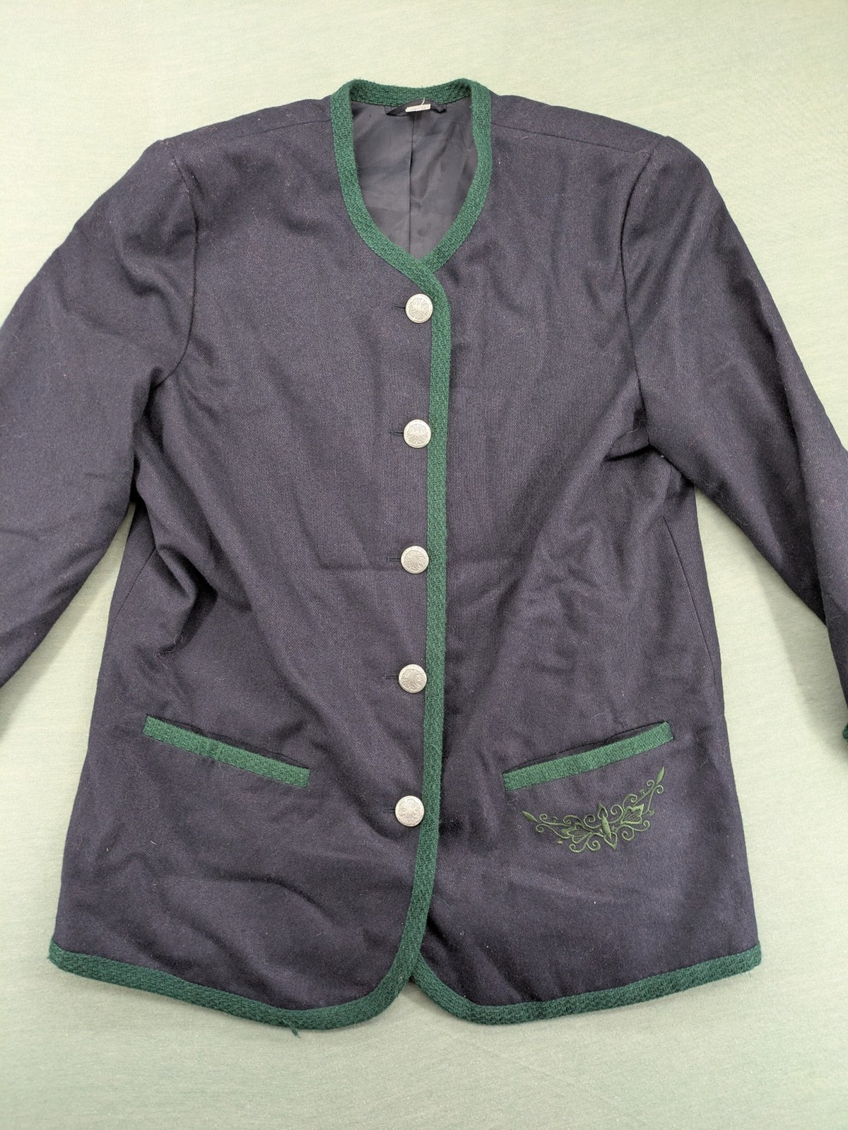 Blazer green and navy jacket with embroidered details and silver buttons.