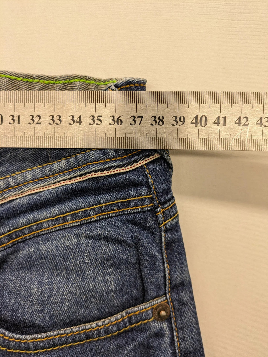 Vingino blue straight jeans medium wash 5-pocket design with zipper fly and stretch denim.