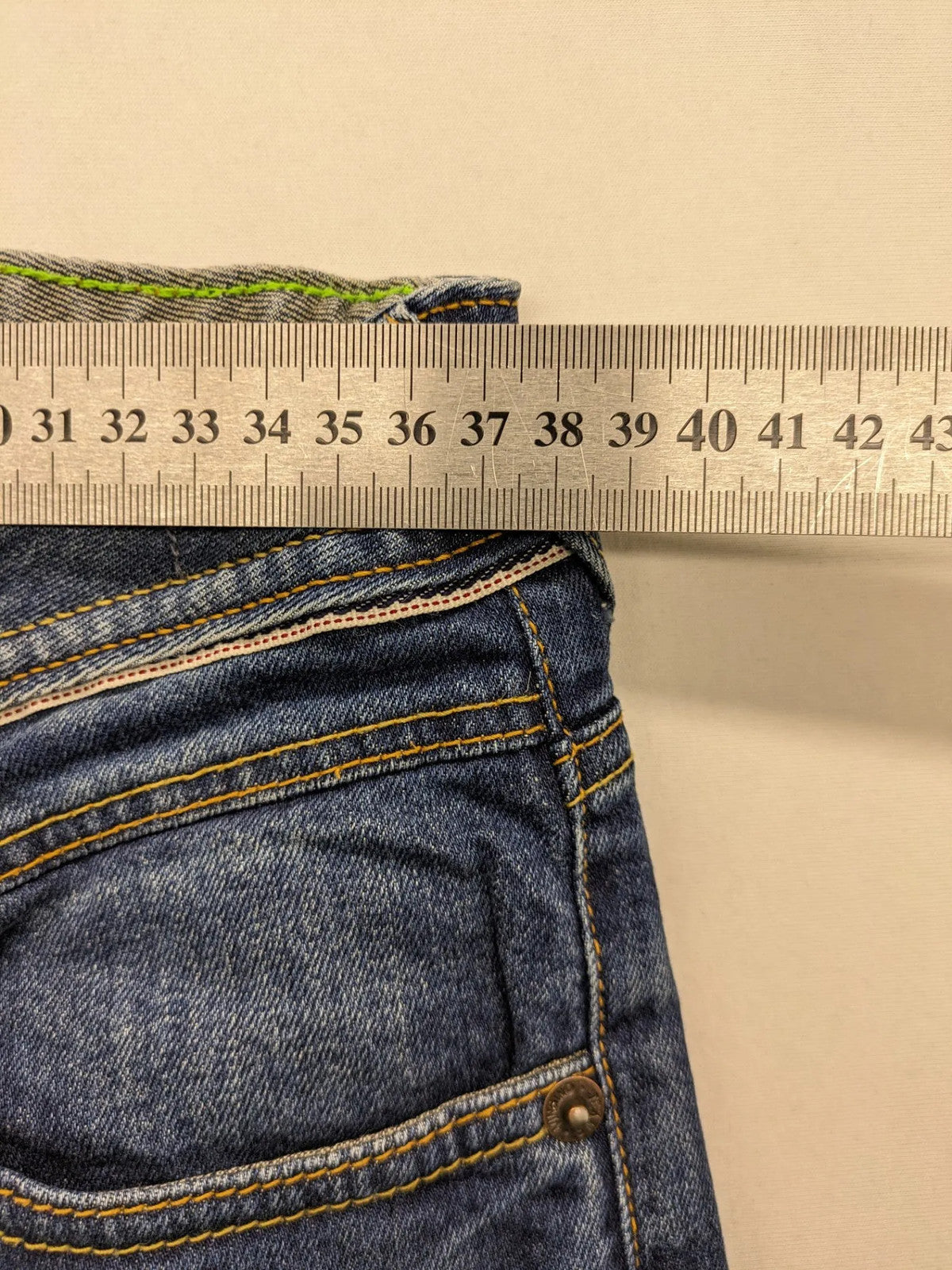 Vingino blue straight jeans medium wash 5-pocket design with zipper fly and stretch denim.