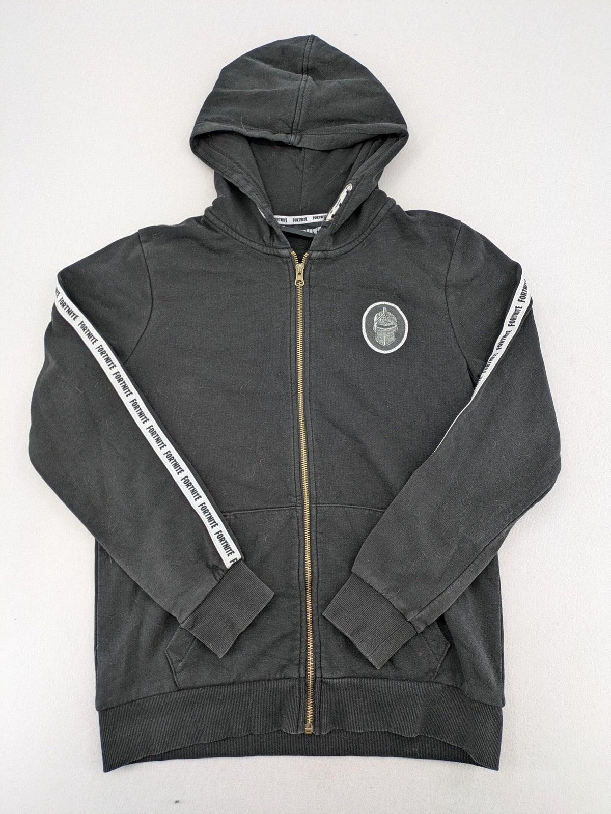 Fortnite black zip-through hoodie with logo on sleeves and Black Knight patch on chest.