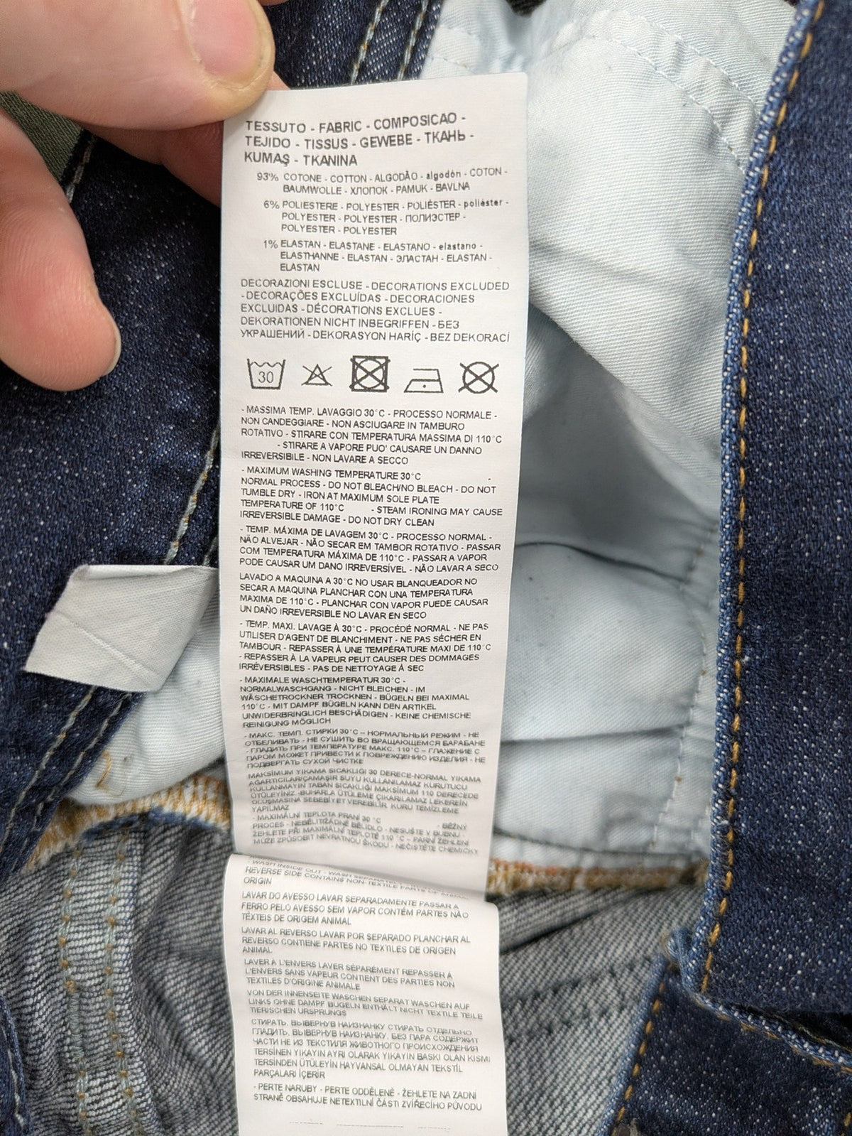 Armani Exchange blue slim fit jeans with distressed details and classic 5-pocket design.