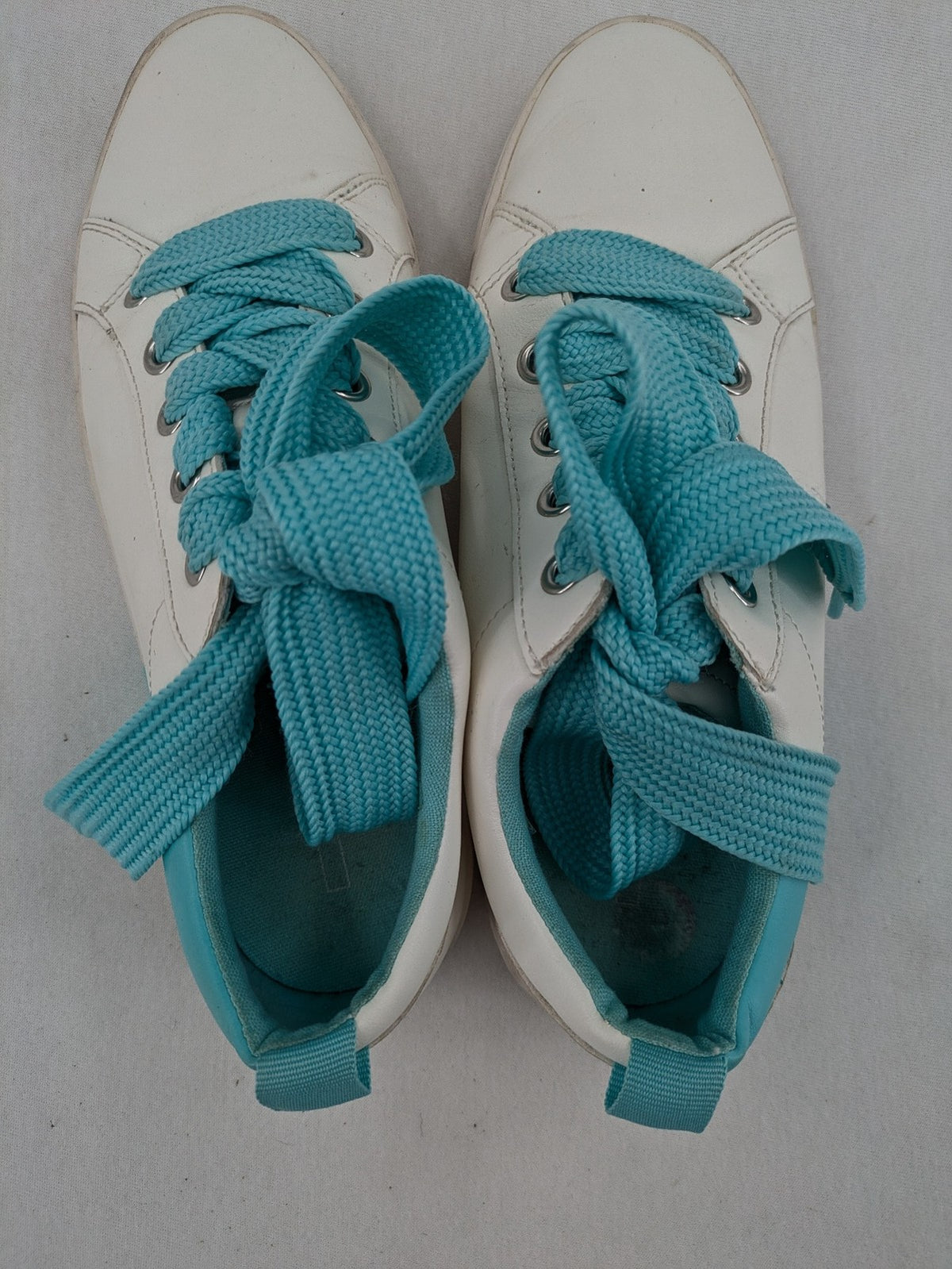 Esprit women's sneakers white with turquoise accents and wide laces.