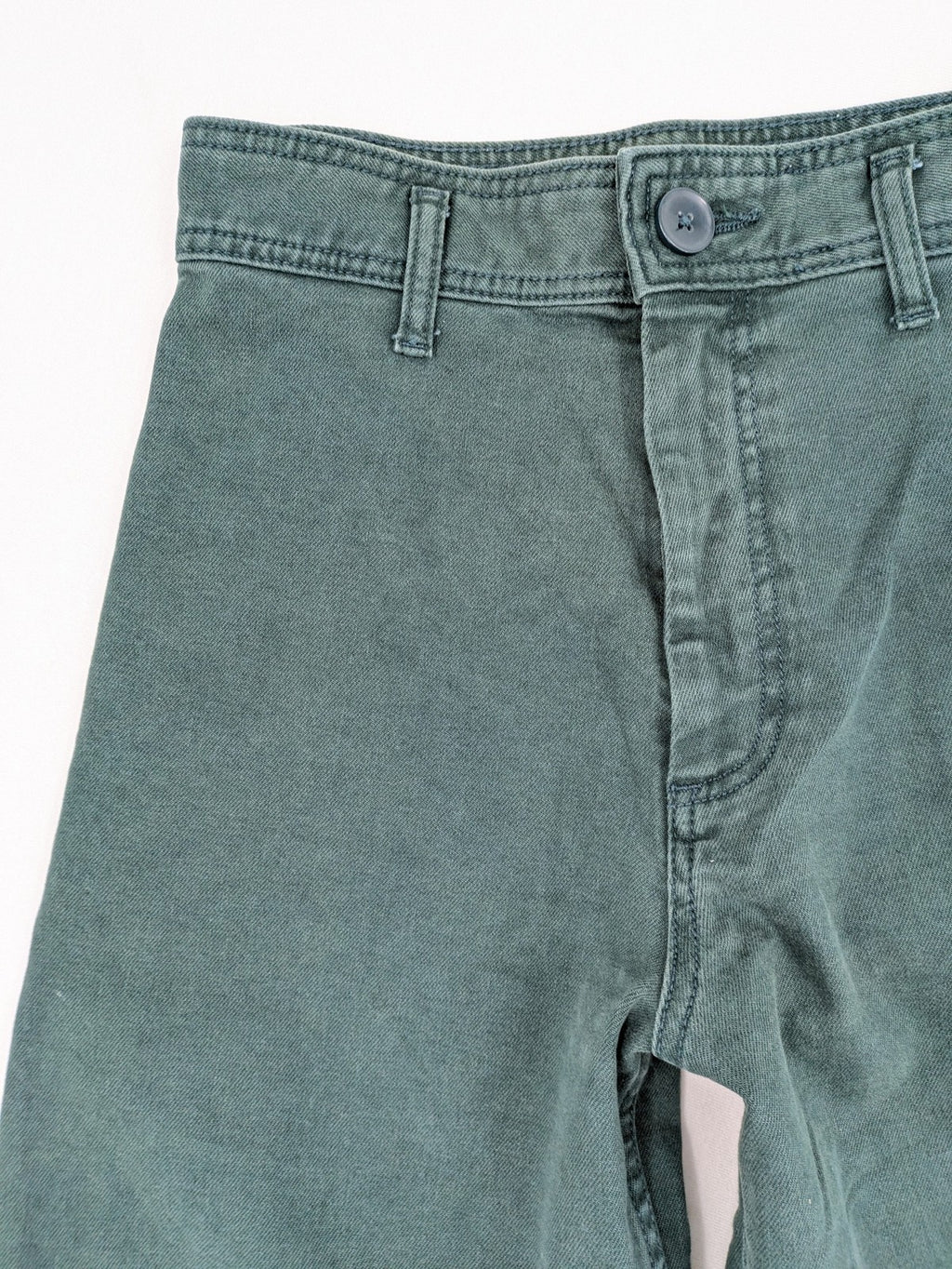 Zara green high waist wide leg jeans with frayed hem and button closure.