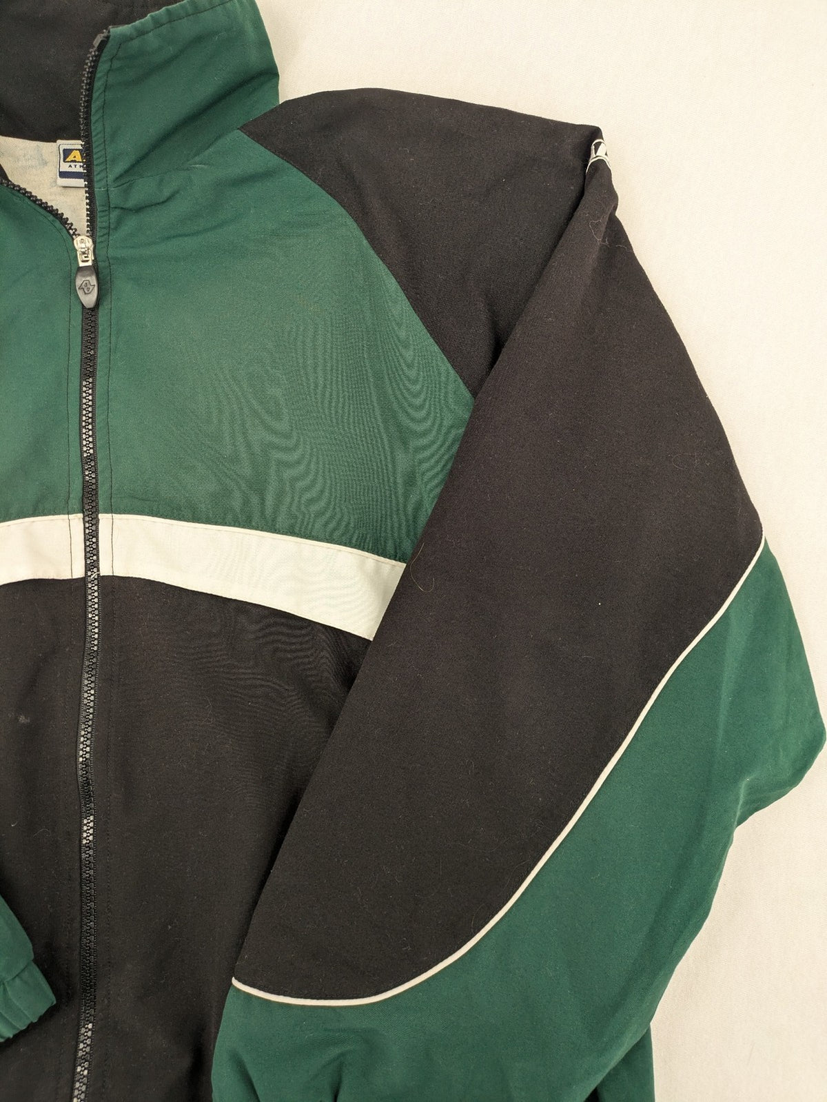 Alex Athletics multi jacket vintage colorblock design with zip, stand collar, and elastic cuffs.