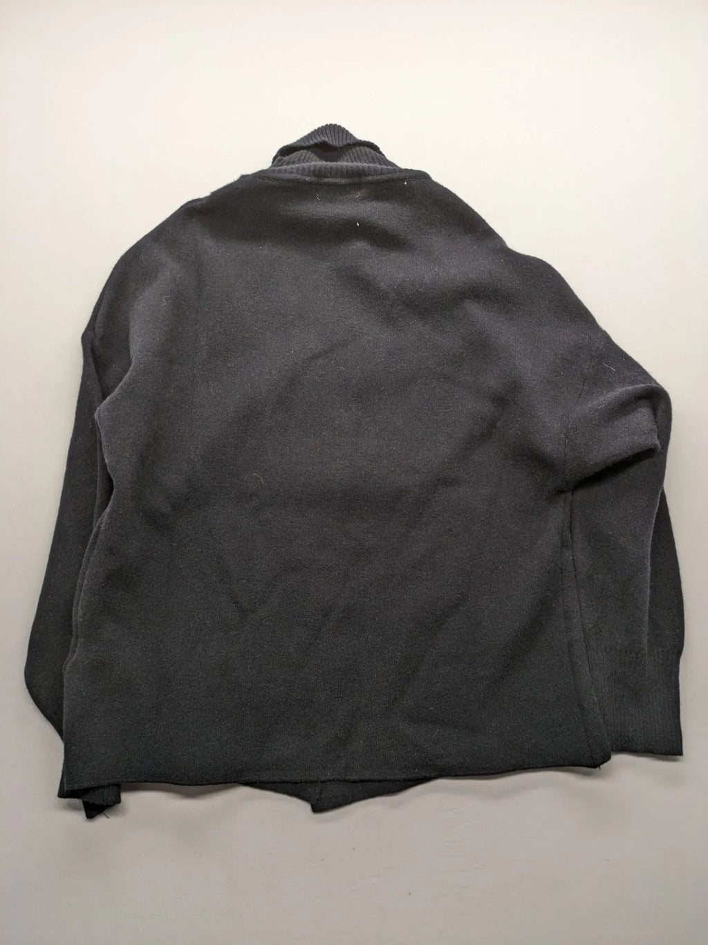 In Shape grey turtle neck jumper asymmetrical design, soft viscose blend material.