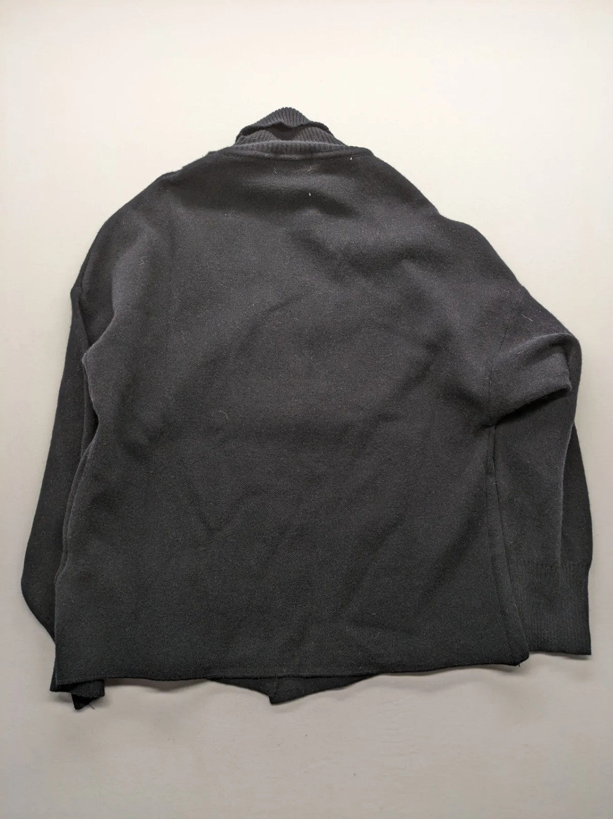 In Shape grey turtle neck jumper asymmetrical design, soft viscose blend material.