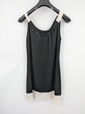 En Focus Studio beige and black top, sleeveless with beaded neckline and tie detail.