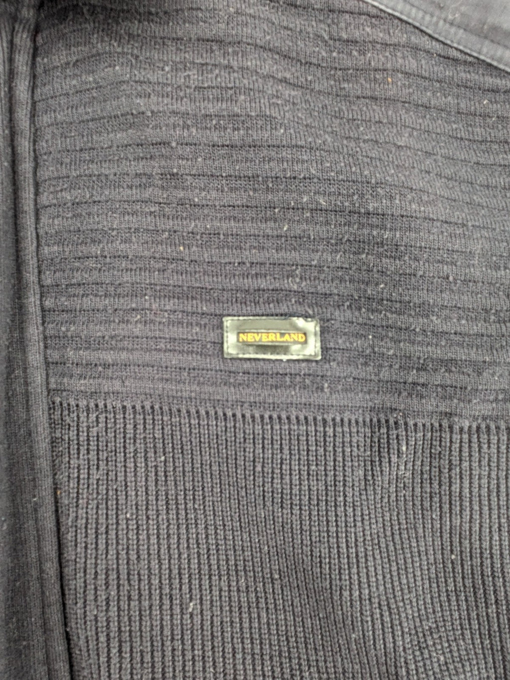 Neverland grey and navy full zip turtle neck jumper with ribbed knit and shoulder patches.