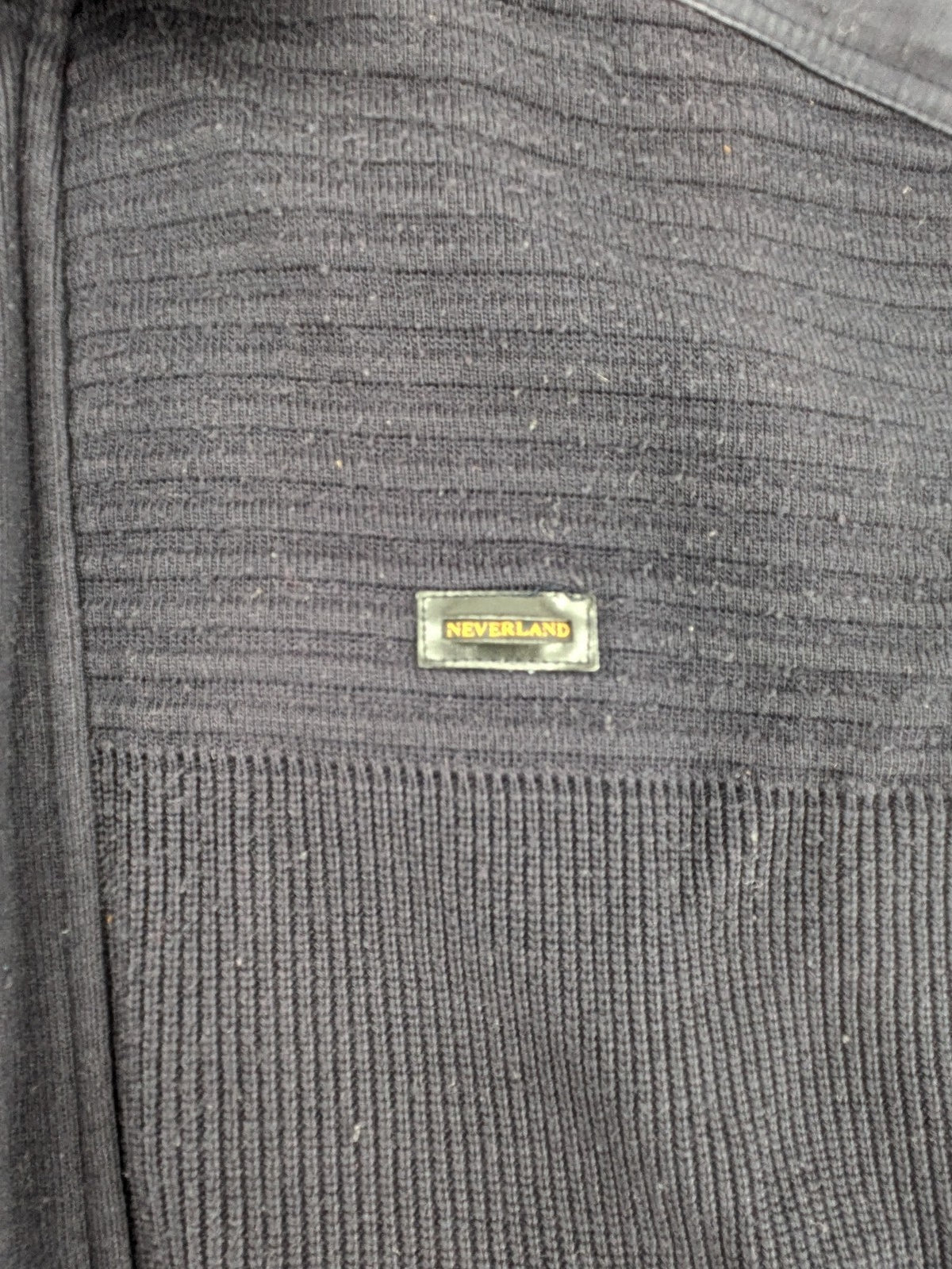 Neverland grey and navy full zip turtle neck jumper with ribbed knit and shoulder patches.