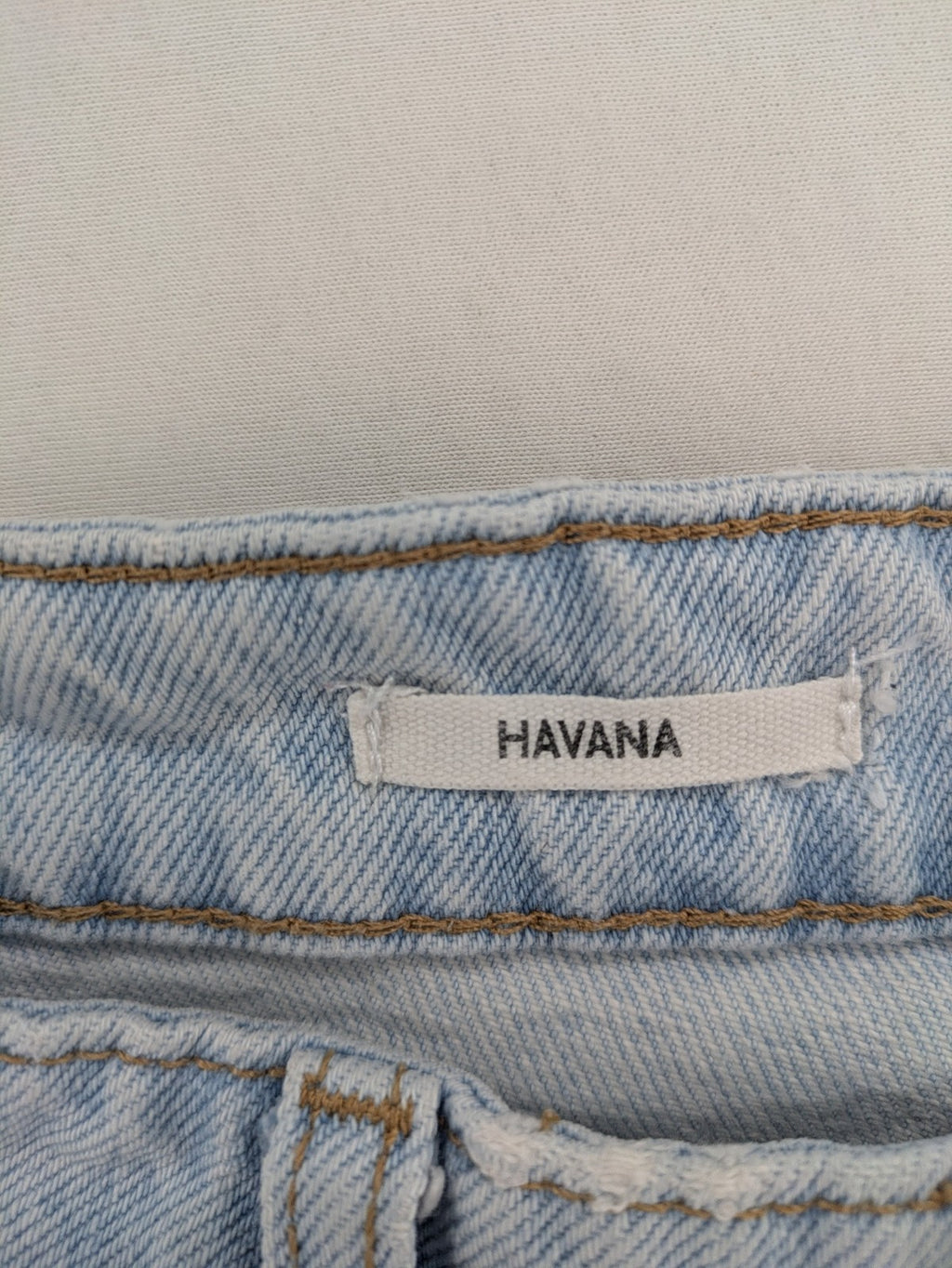 MNG blue high waist mom jeans with raw hem and five-pocket style.