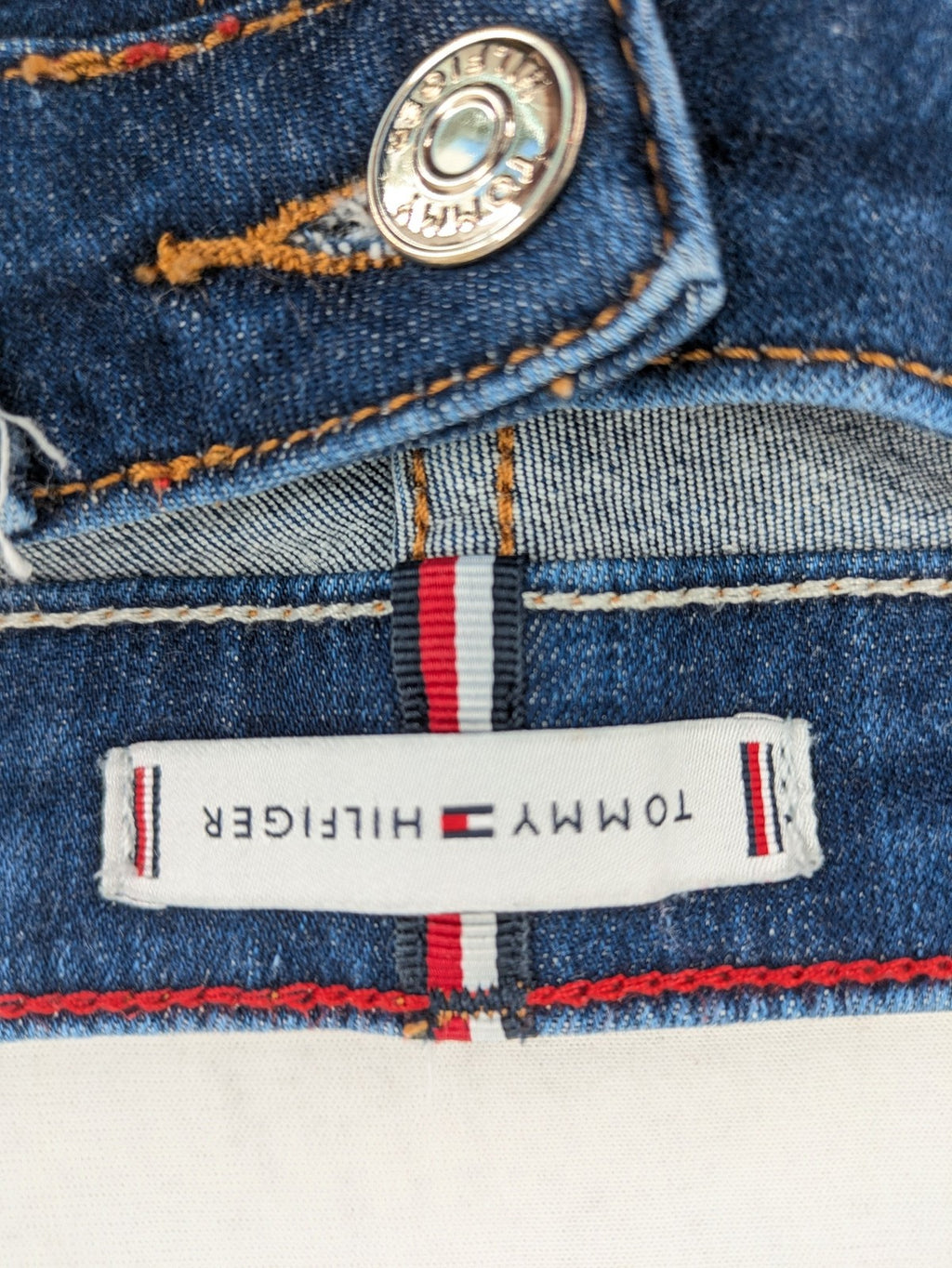 Tommy Hilfiger blue skinny jeans, five-pocket design, made from organic cotton blend.