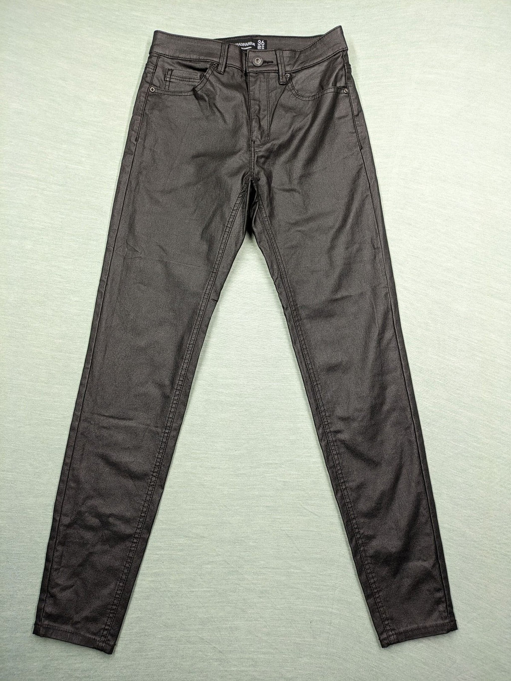 Stradivarius black coated skinny jeans faux leather finish stylish silhouette
