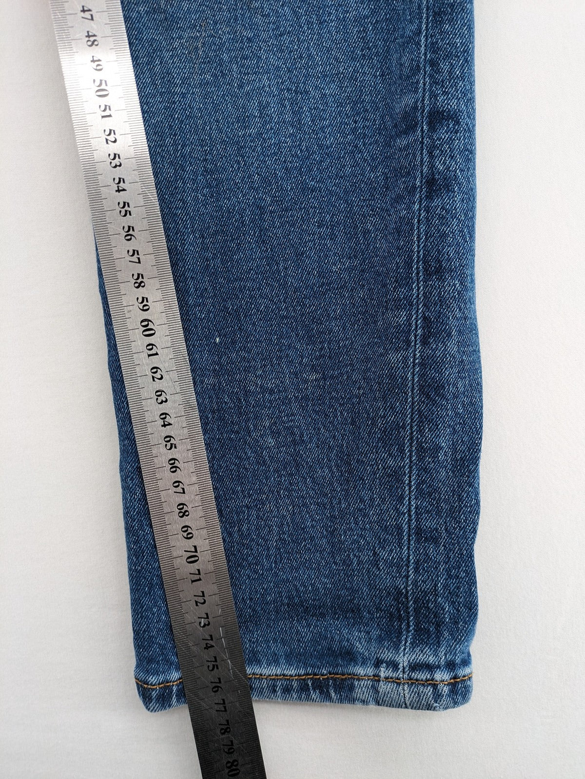 LTB blue straight jeans with low rise, button fly, and classic denim wash.