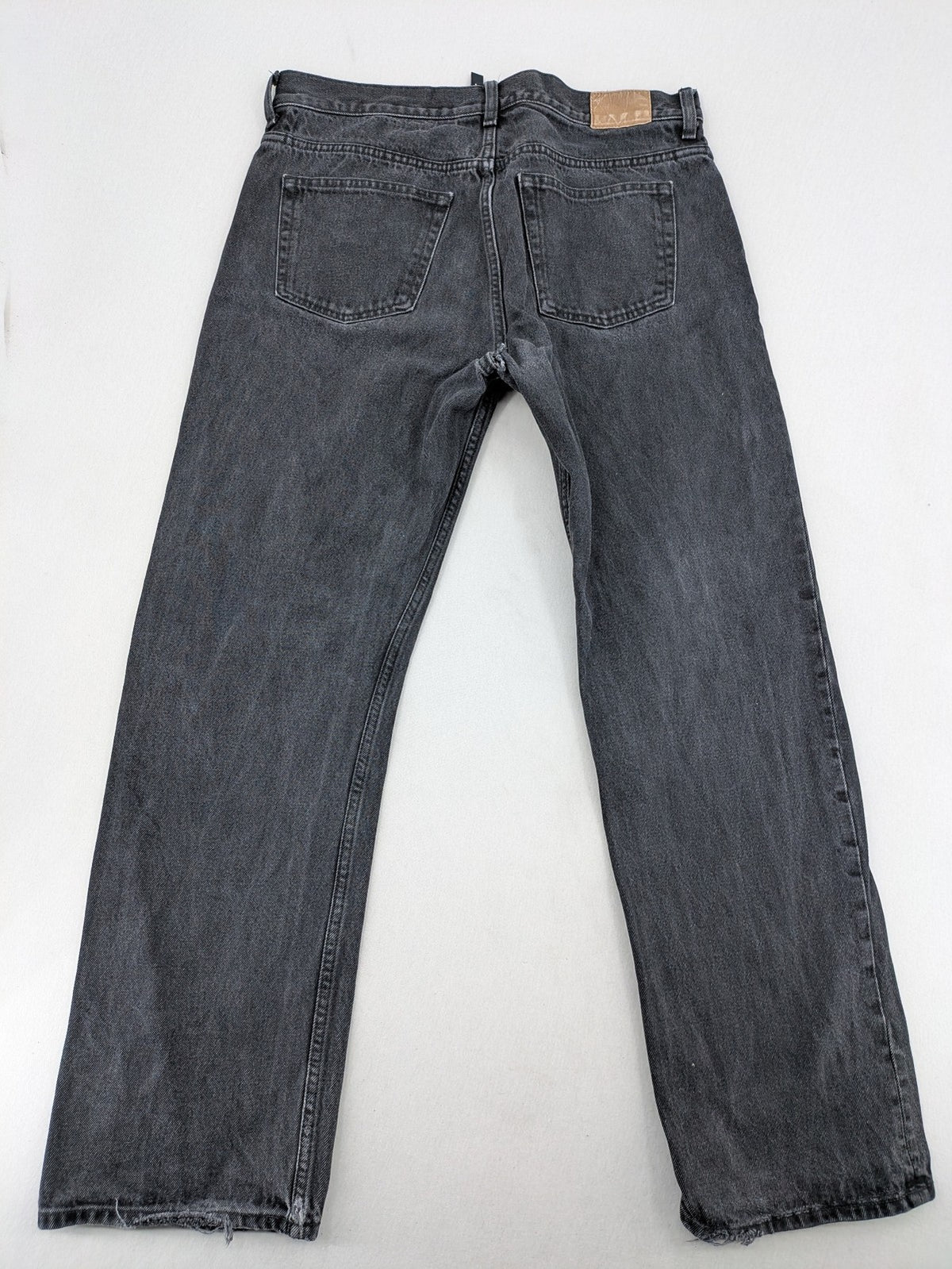 Weekday grey straight jeans washed denim with button fly and classic fit.