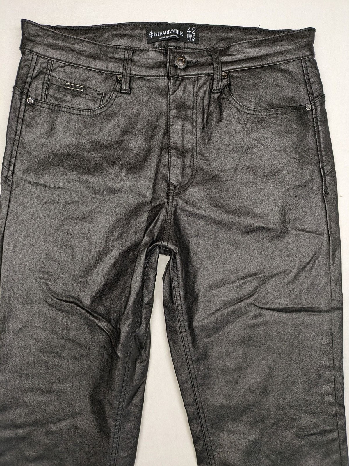 Stradivarius black coated straight jeans with leather-like finish and stretchy material.