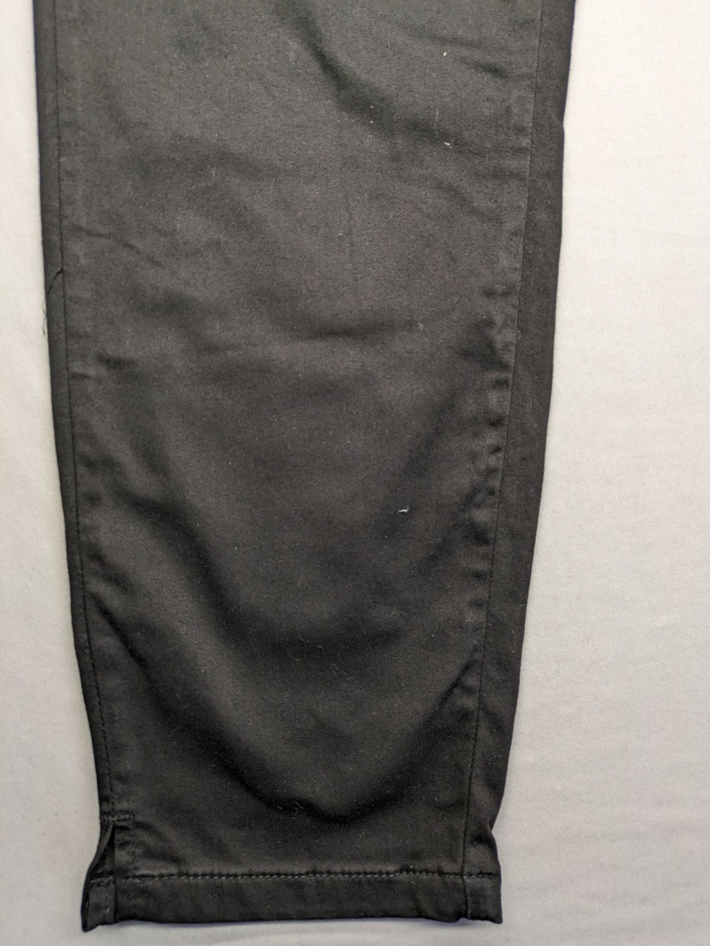 Colac black straight jeans high waist with double button, zipper pockets, and stretch material.
