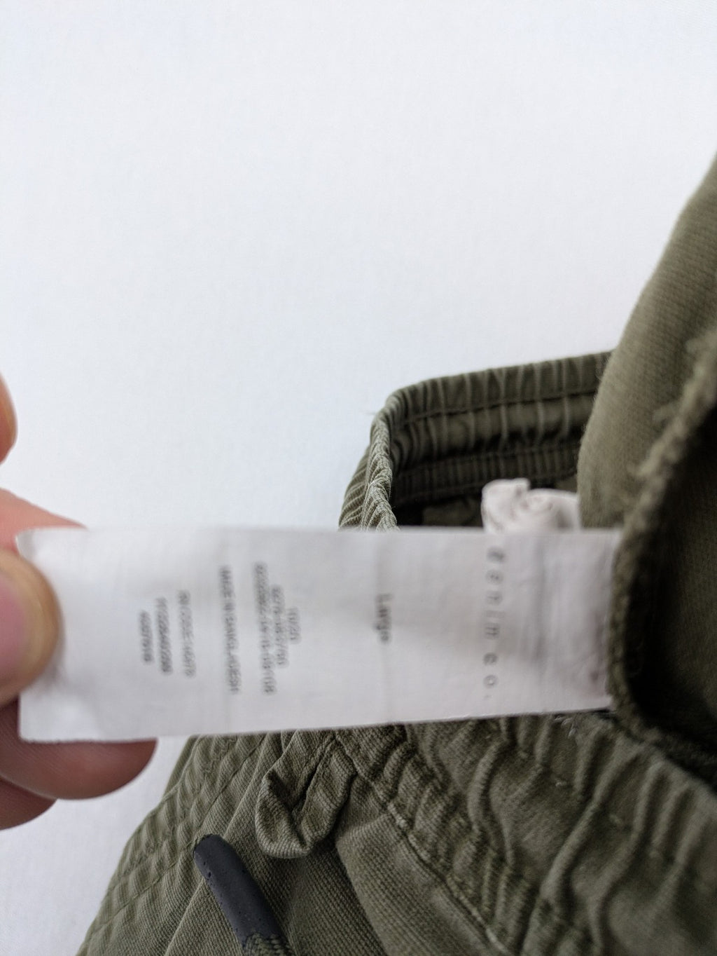 Denim & Co. khaki cargo jogger pants with elastic waistband and multiple pockets.