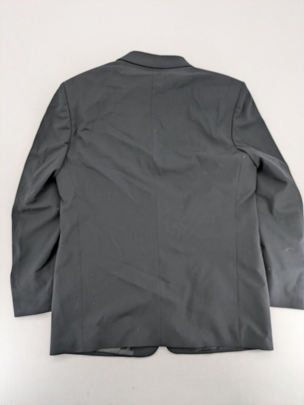 Jake*s pink jacket classic design with falling lapel and three-button closure.