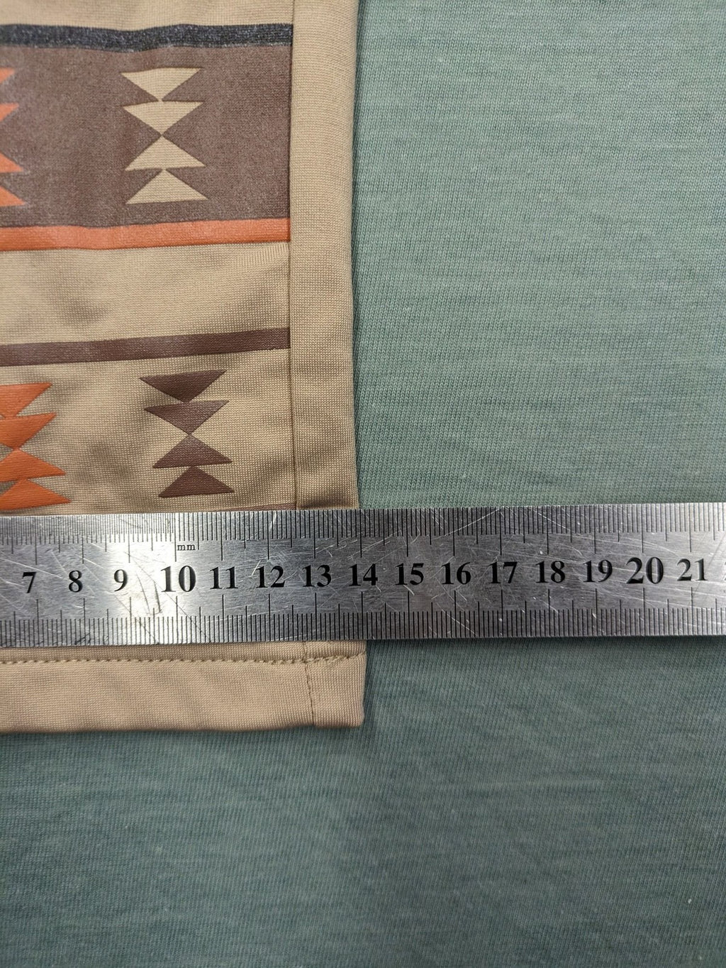 bpc bonprix collection beige leggings with colorful Aztec pattern at knees and hem