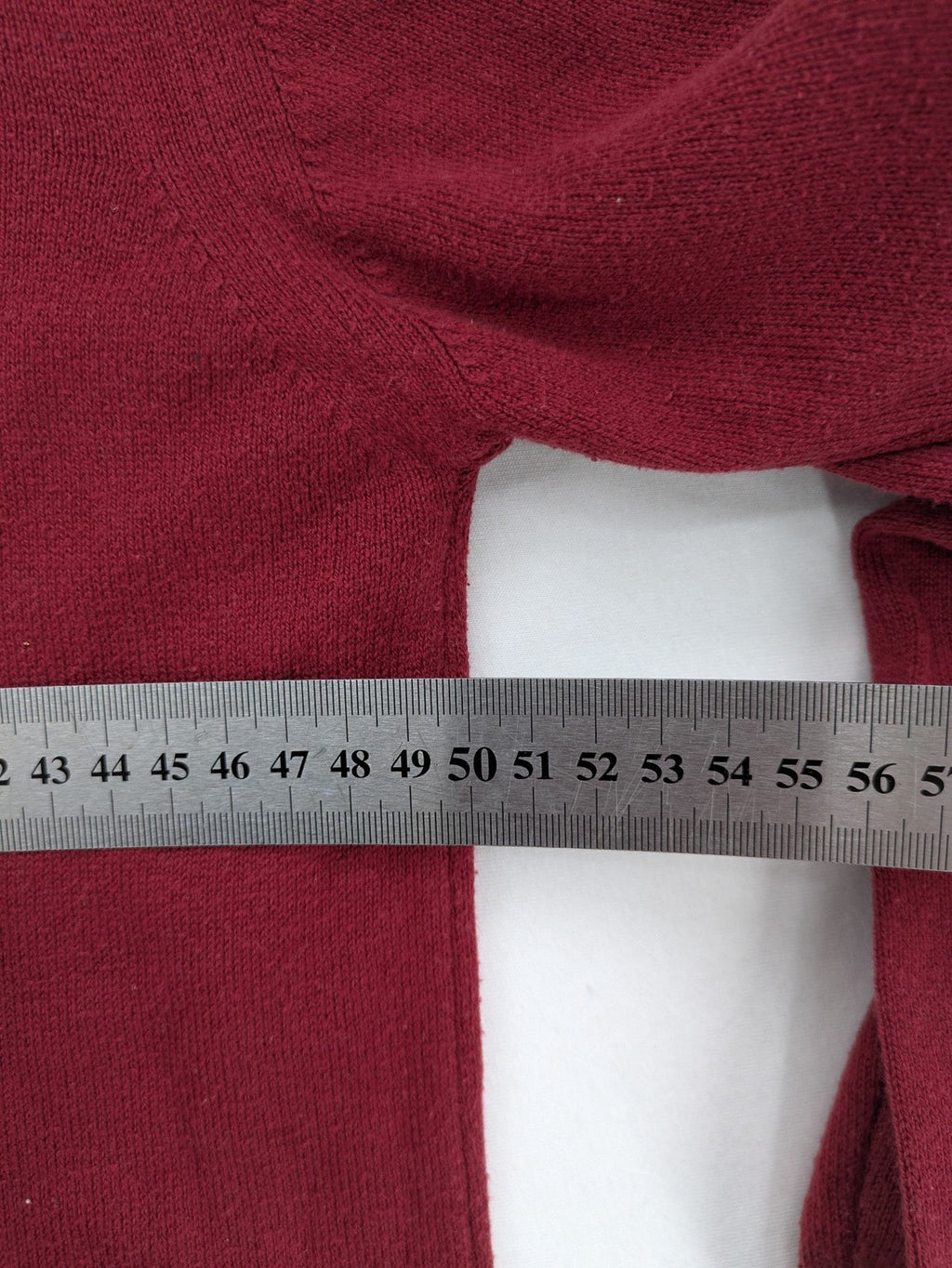 Les Corps burgundy turtle neck jumper with ribbed details and soft cotton blend material.