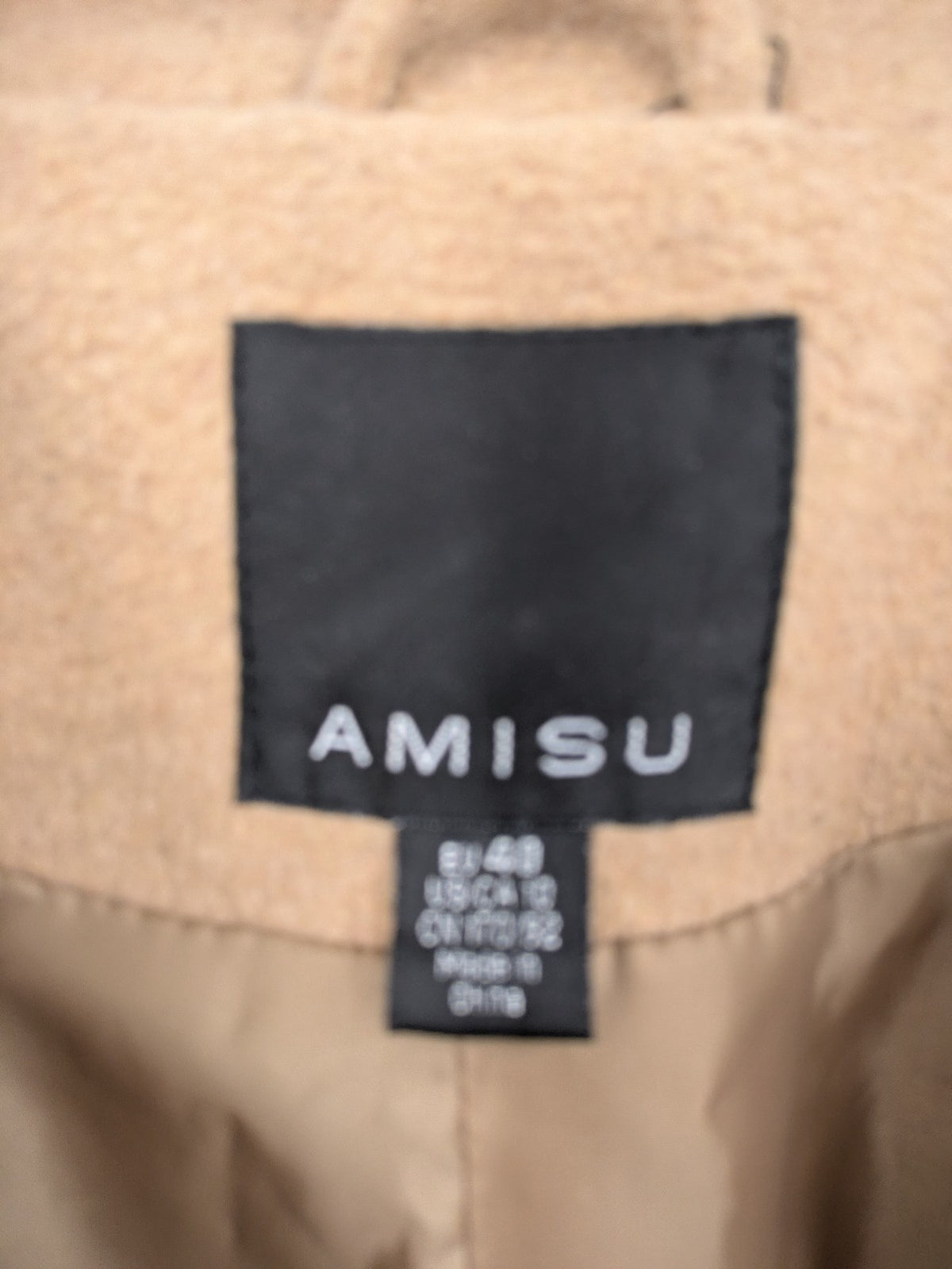 Amisu beige wool jacket single-breasted with lapel collar and two flap pockets.