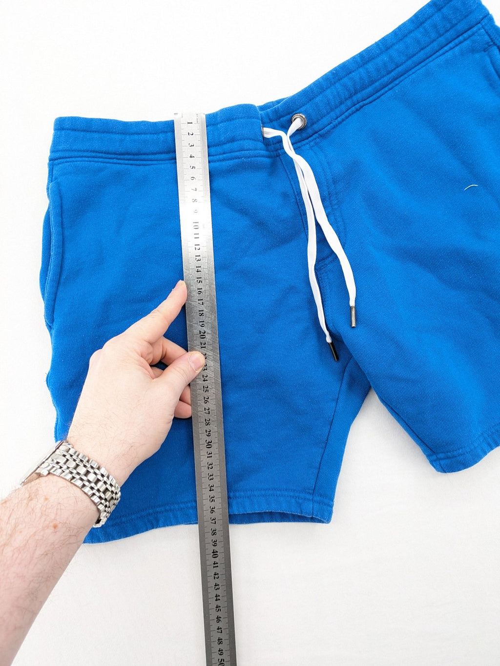 Chiemsee blue sweatshorts with logo print, elastic waistband, and side pockets.