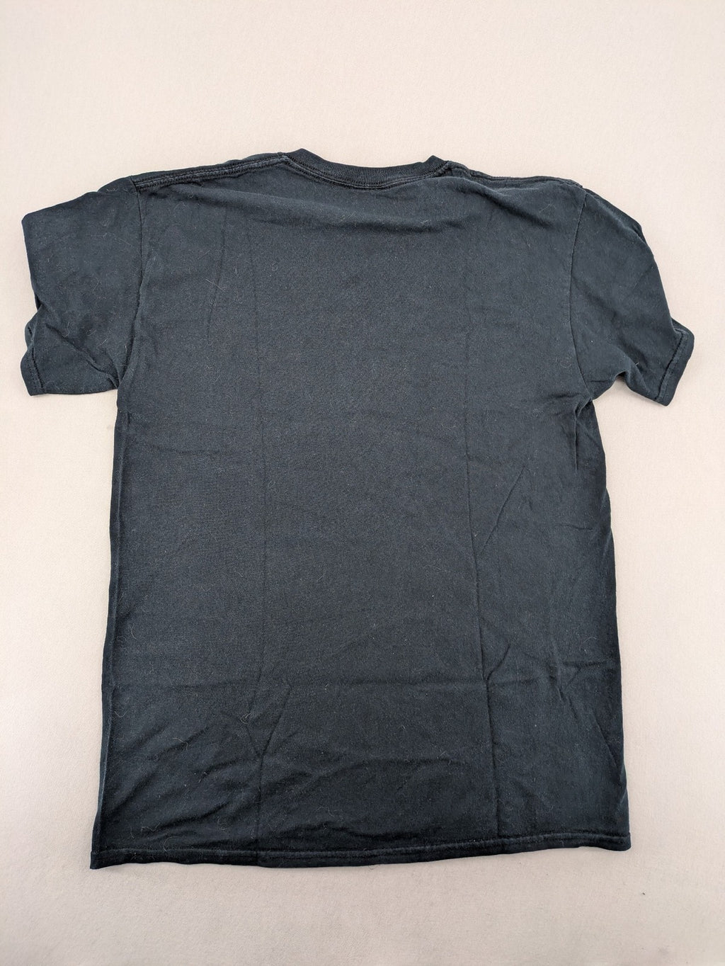 Guns N' Roses black t-shirt featuring Appetite for Destruction graphic with skulls.