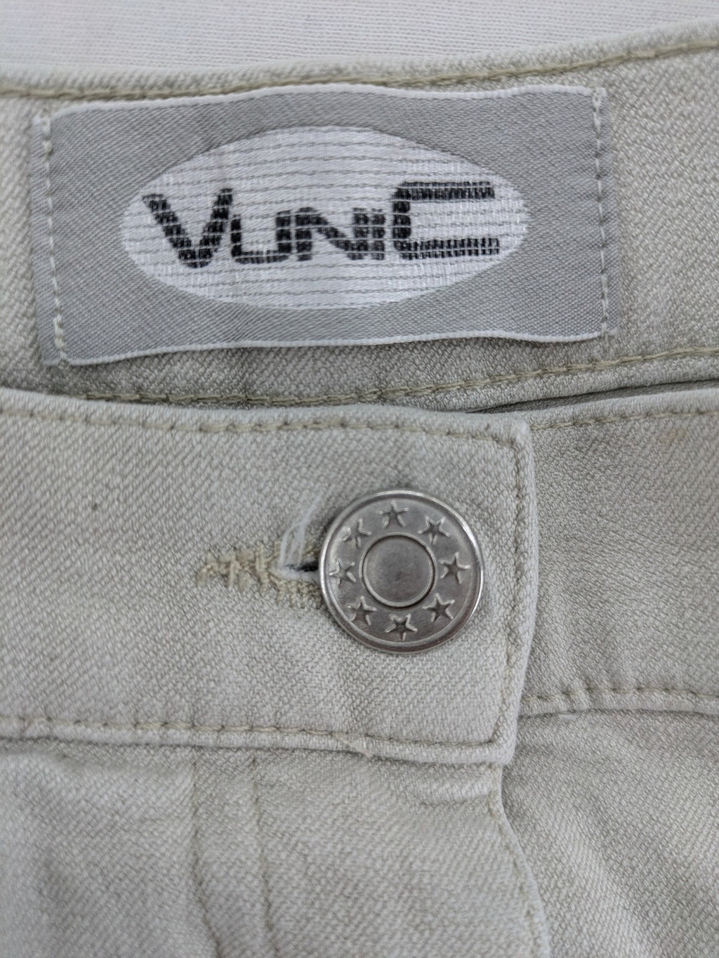 Vunic beige chinos with straight leg, 5-pocket design, and classic front zipper closure.