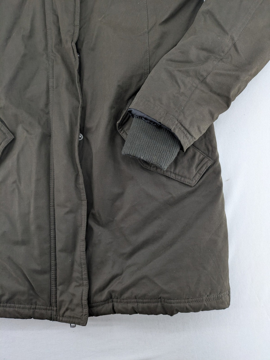 ONLY khaki parka coat with hood, quilted lining, and ribbed cuffs.