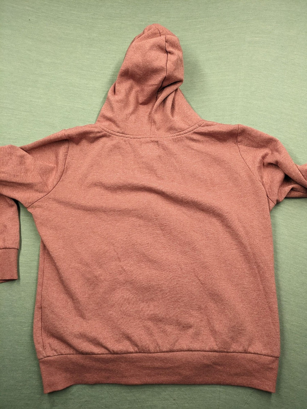 ONLY pink zip-through hoodie with hood, front zipper, and two pockets.