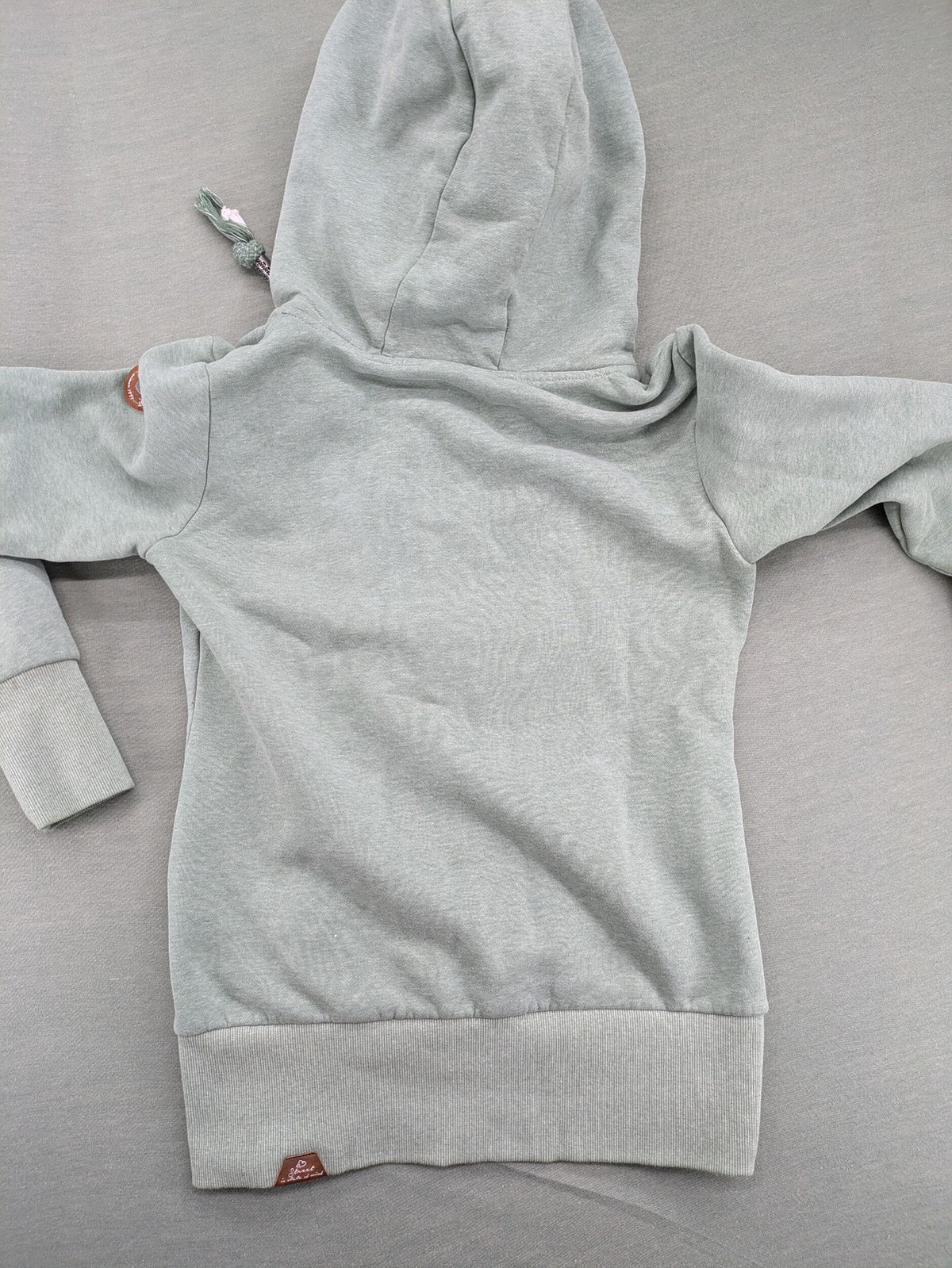 Ragwear grey hoodie jacket with high collar, thick drawstrings, and vegan materials.