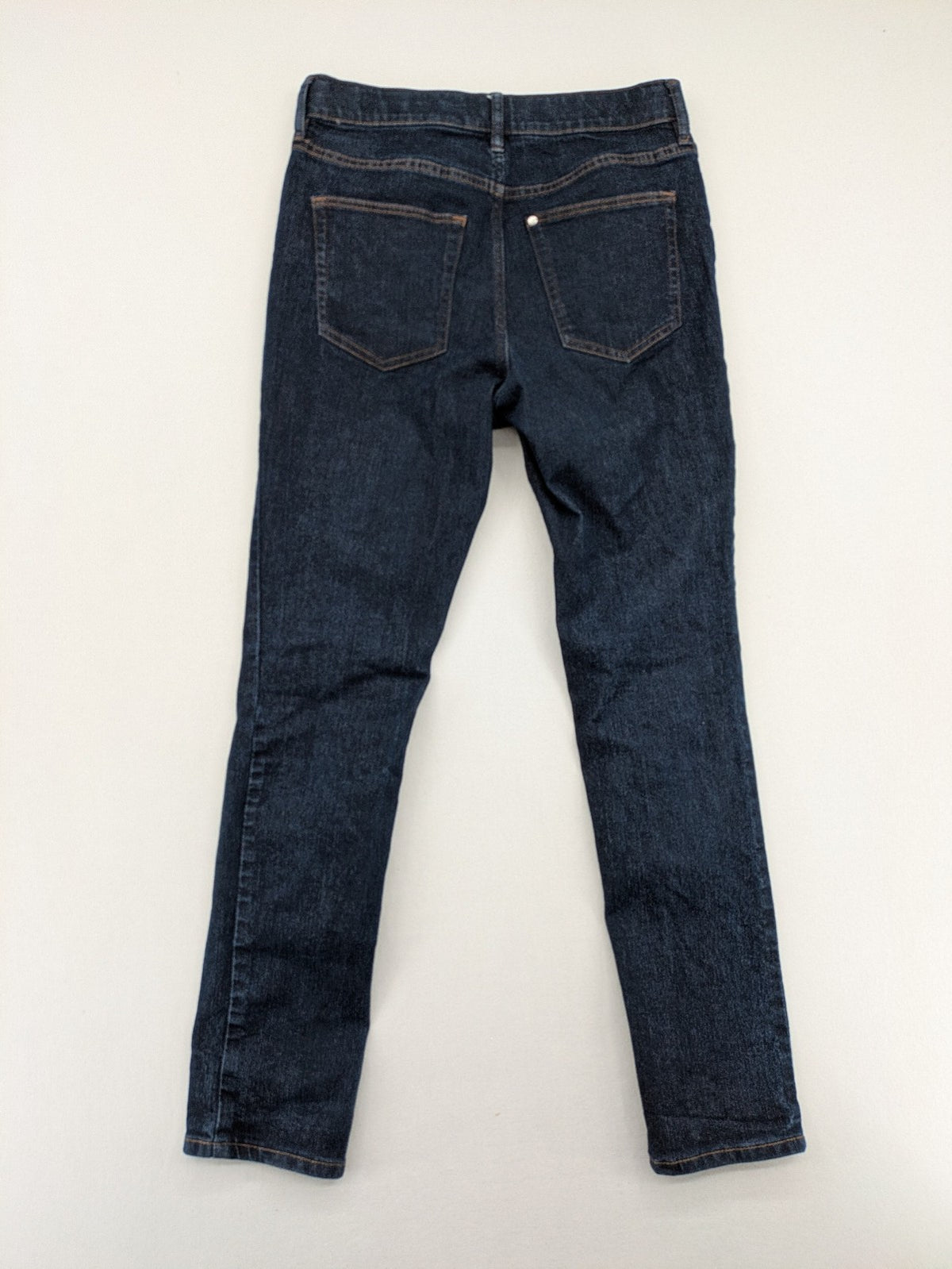 H&M blue skinny fit jeans with classic 5-pocket style and button closure.