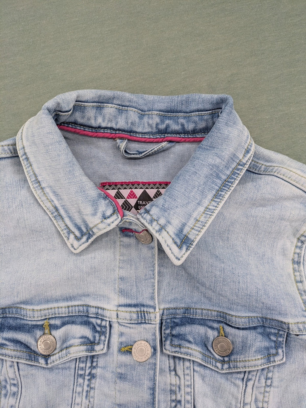 hle blue denim jacket lightwash classic trucker style with pink collar trim and pockets