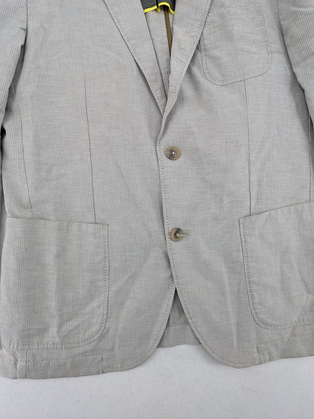 Camel Active grey cord blazer with classic two-button closure and practical zippered inner pockets.