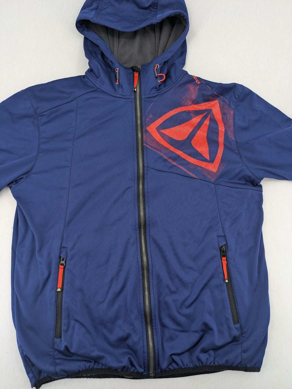 Firefly blue softshell jacket with adjustable hood and prominent chest logo.