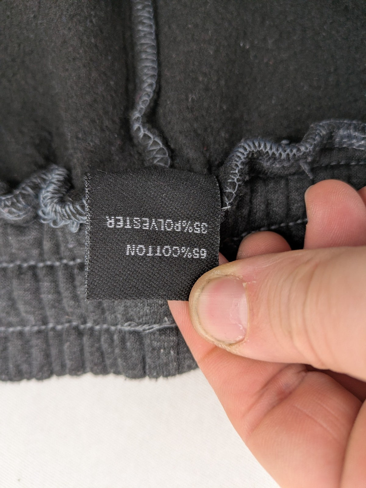 Amstaff grey sweatpants with large dog logo and "Trust & Loyalty" text.