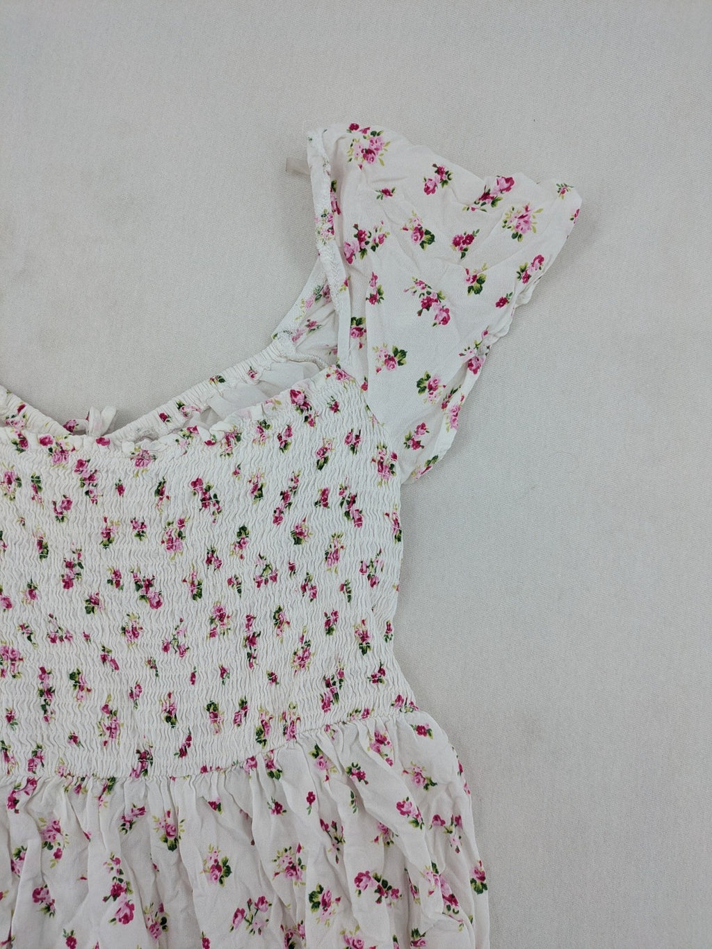 FB Sister floral playsuit white with pink flowers, smocked bodice, lightweight viscose material.
