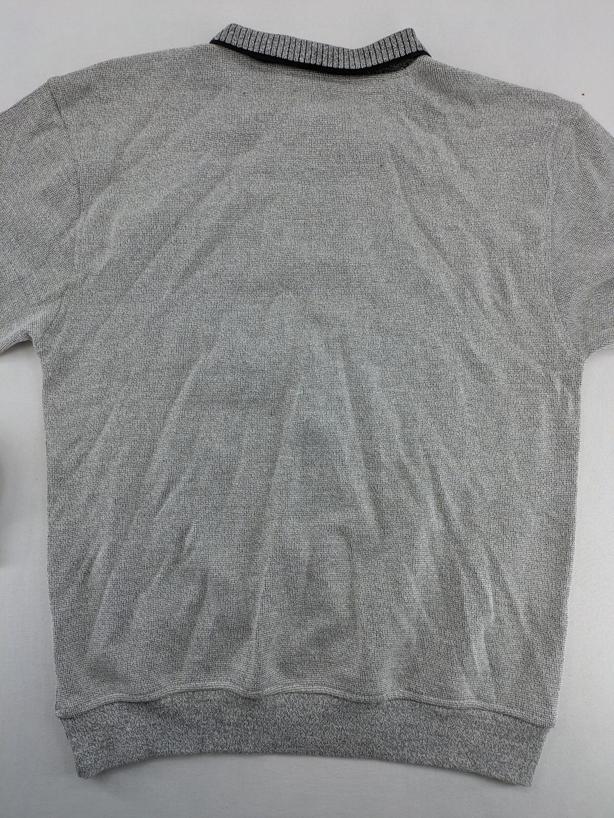 Danilo turtle neck jumper grey melange with black zipper and ribbed cuffs.