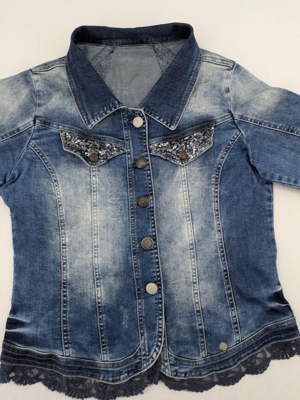 TREDY blue denim jacket with sequins, lace trim, and fitted design.