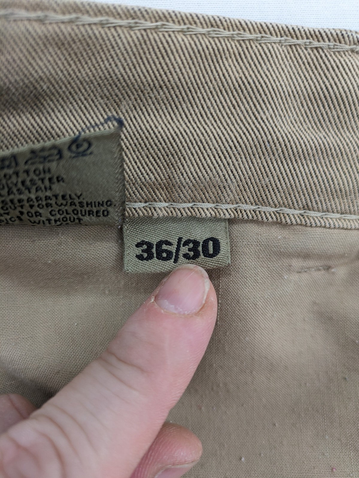 Joker beige straight jeans with double saddle stitching and classic 5-pocket design.
